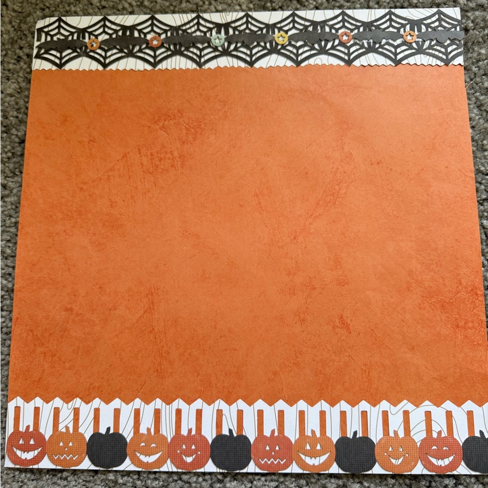 Halloween Scrapbook Paper with Pumpkin and Spider Web Design